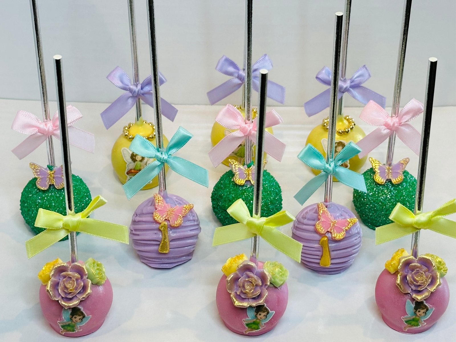 Custom decorated cake pops by Heavenly Dipped Delights