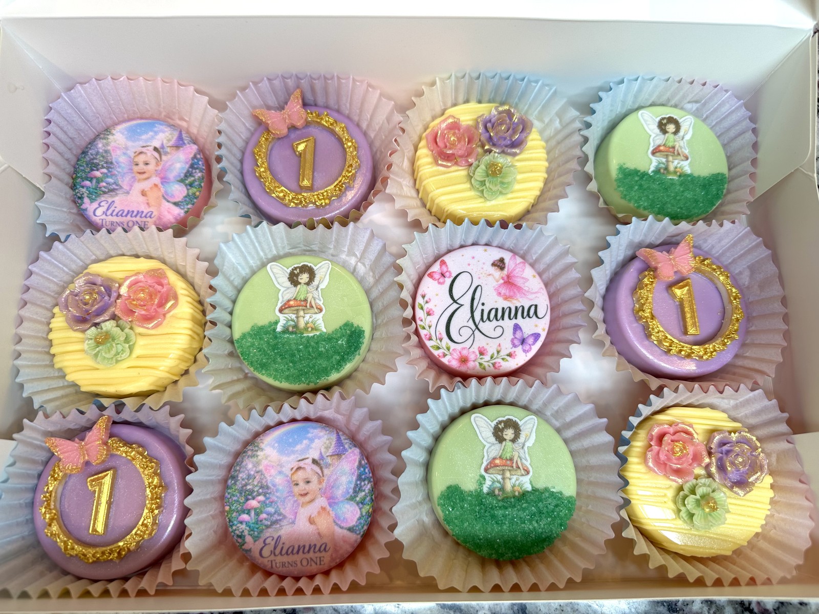 Easter themed chocolate covered Oreos arranged in a pink basket