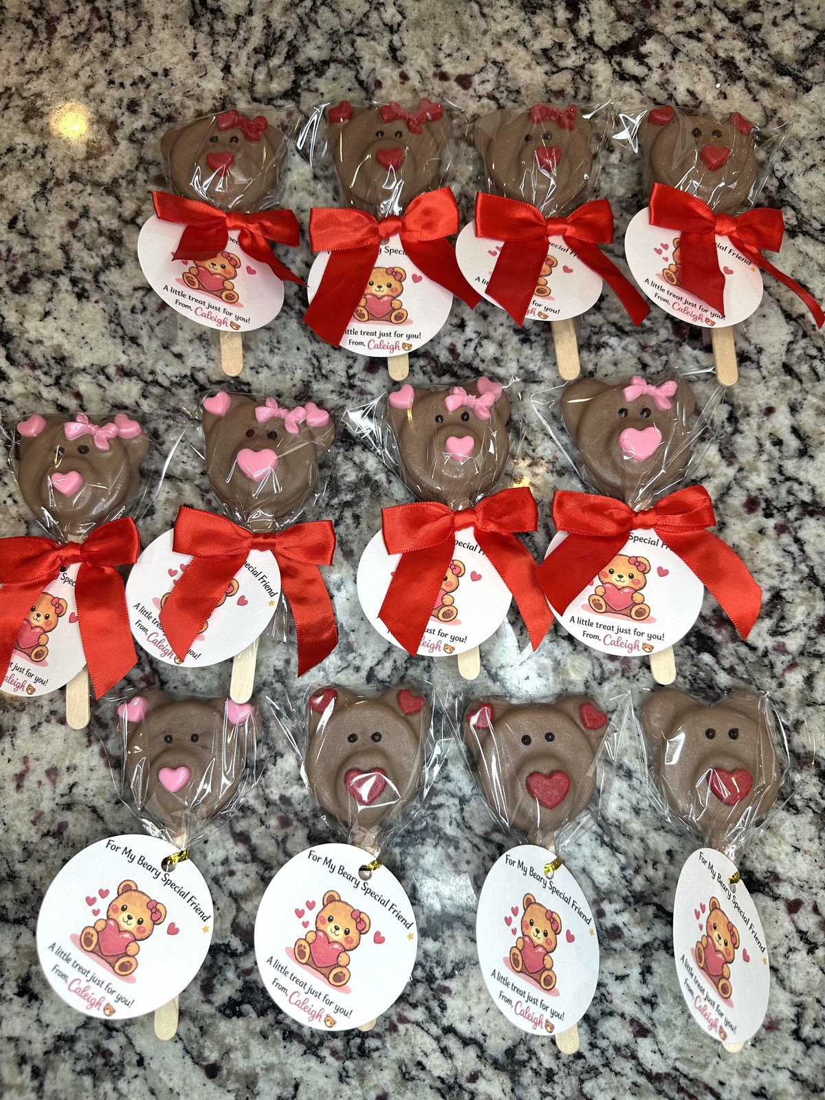 Valentine teddy bear themed chocolate covered Oreos with red bows