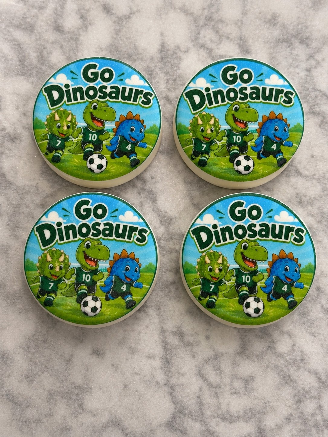 Dinosaur soccer themed chocolate covered Oreos