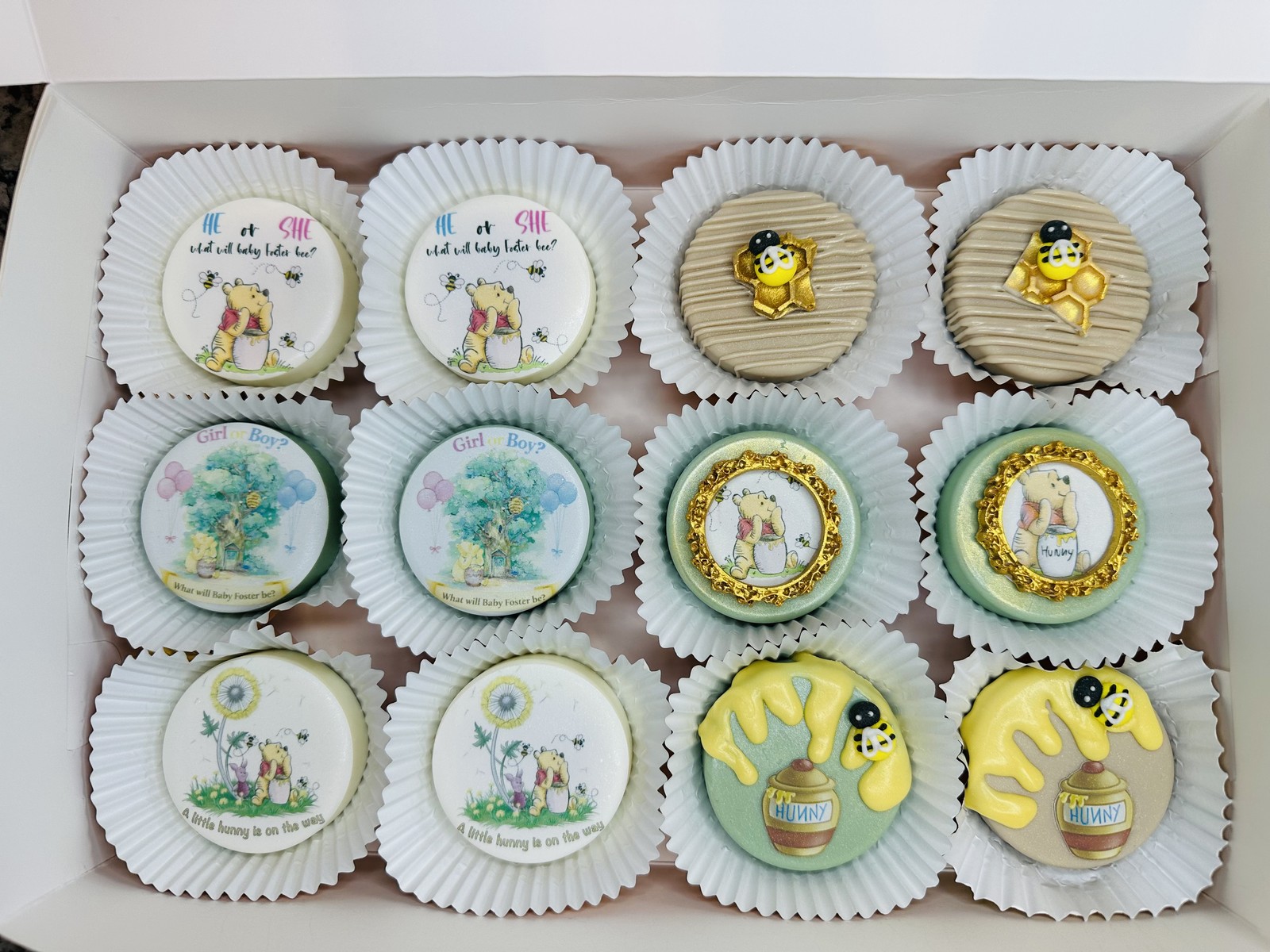 Winnie the Pooh gender reveal chocolate covered Oreos with bees, honey details, edible images, and ornate gold frames