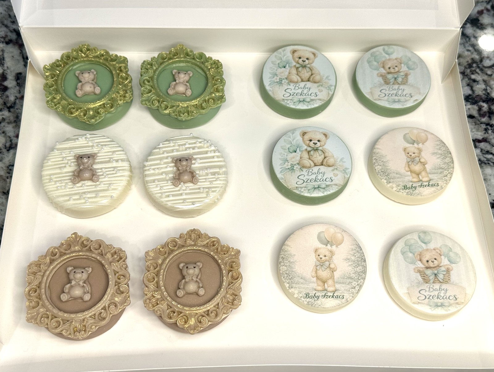 Elegant sage, ivory, and gold teddy bear baby shower chocolate covered Oreos with personalized edible images and ornate frames