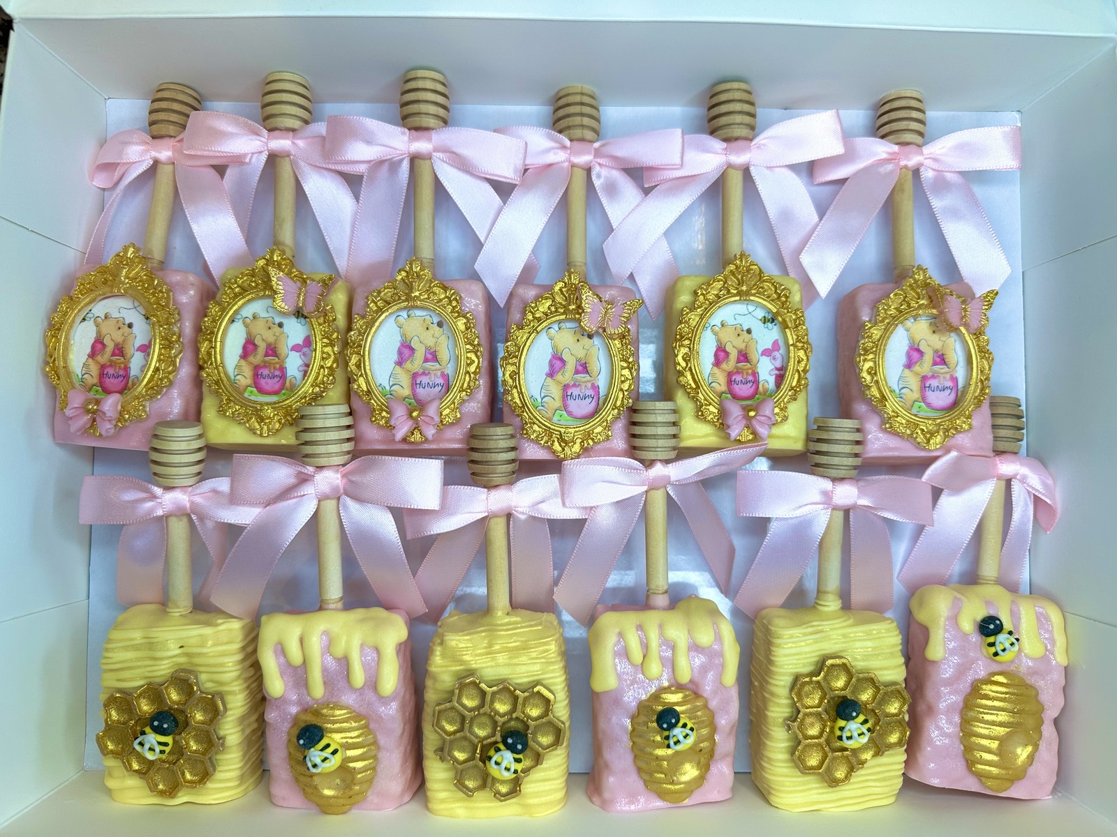 Elegant Winnie the Pooh graduation chocolate covered Rice Krispie treat collection in sage, ivory, taupe, and gold with framed portraits and honeycomb details
