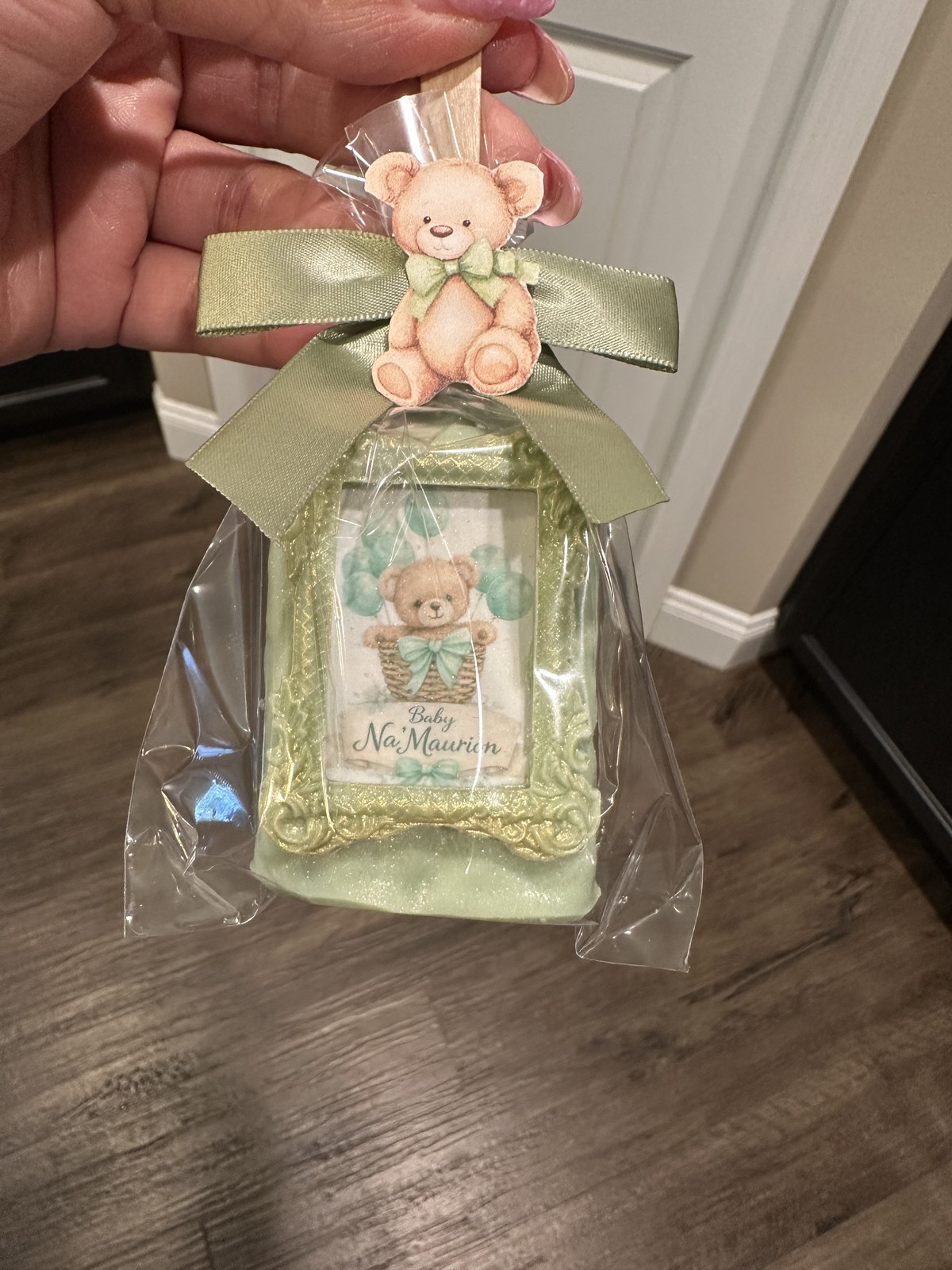 Individually wrapped sage green framed teddy bear chocolate covered Rice Krispie treat with matching bow