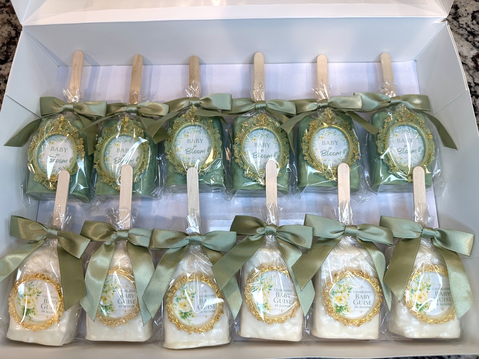 Luxury green, taupe, and gold Two Little Wild Ones chocolate covered Rice Krispie treat collection with ornate frames, jungle animals, and sculpted gold details