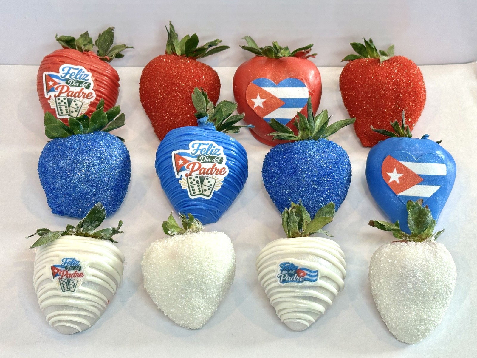 Cuba themed chocolate covered strawberries in red, white, and blue