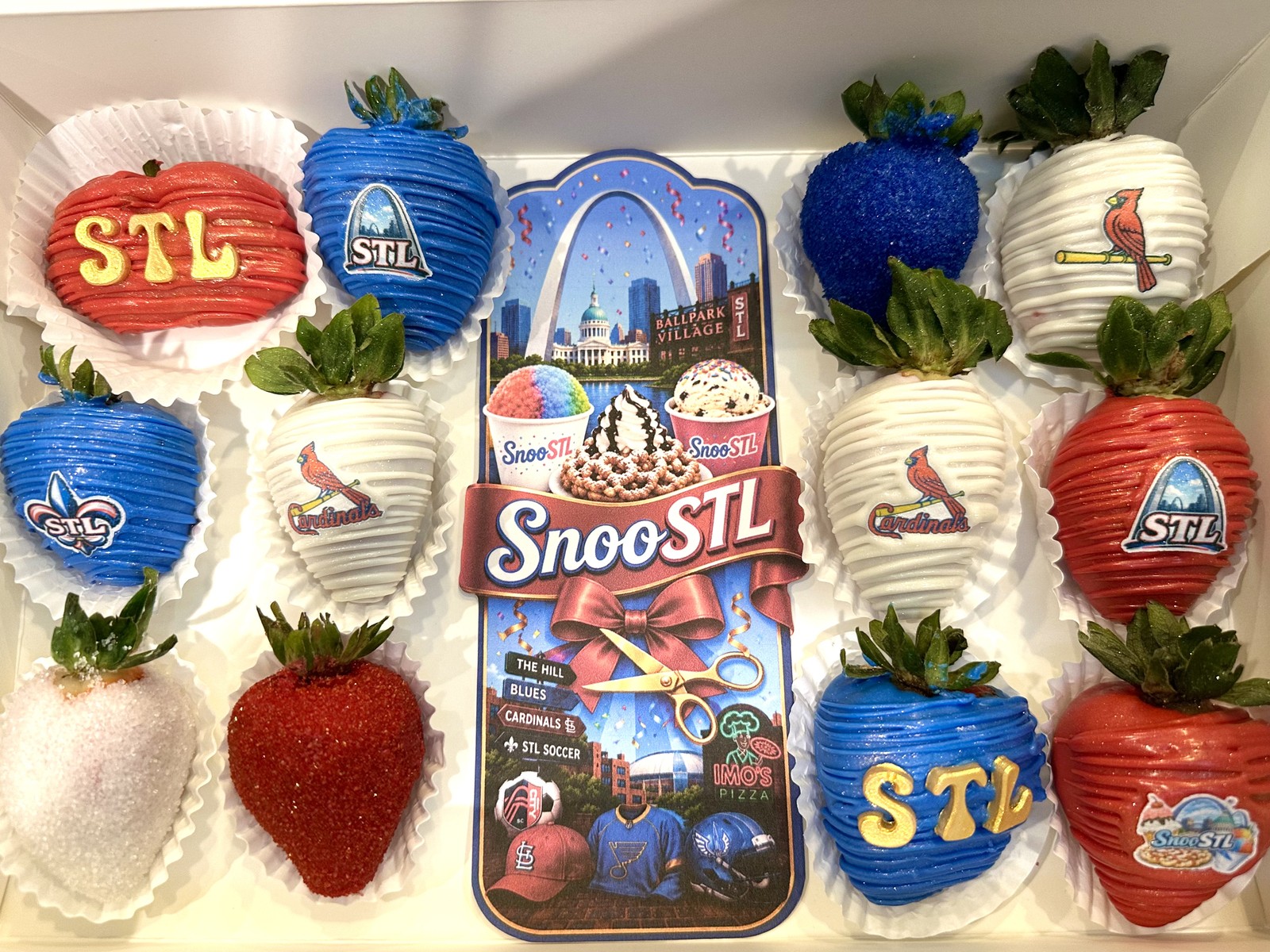 St. Louis themed chocolate covered strawberries in red, white, and blue
