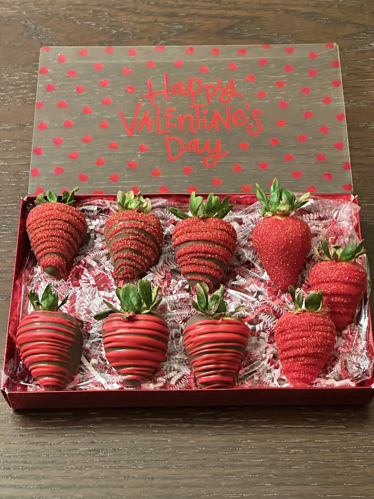 Pink Valentine chocolate covered strawberries arranged in a gift box