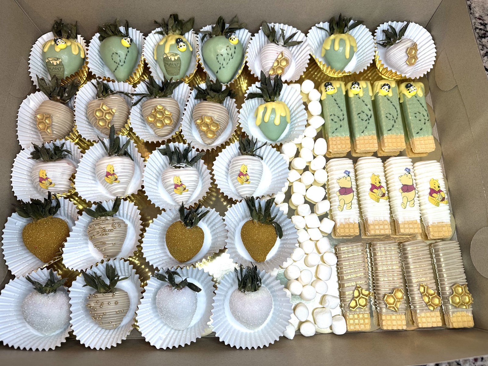 Winnie the Pooh honey themed dipped wafers coordinated with chocolate covered strawberries and marshmallows