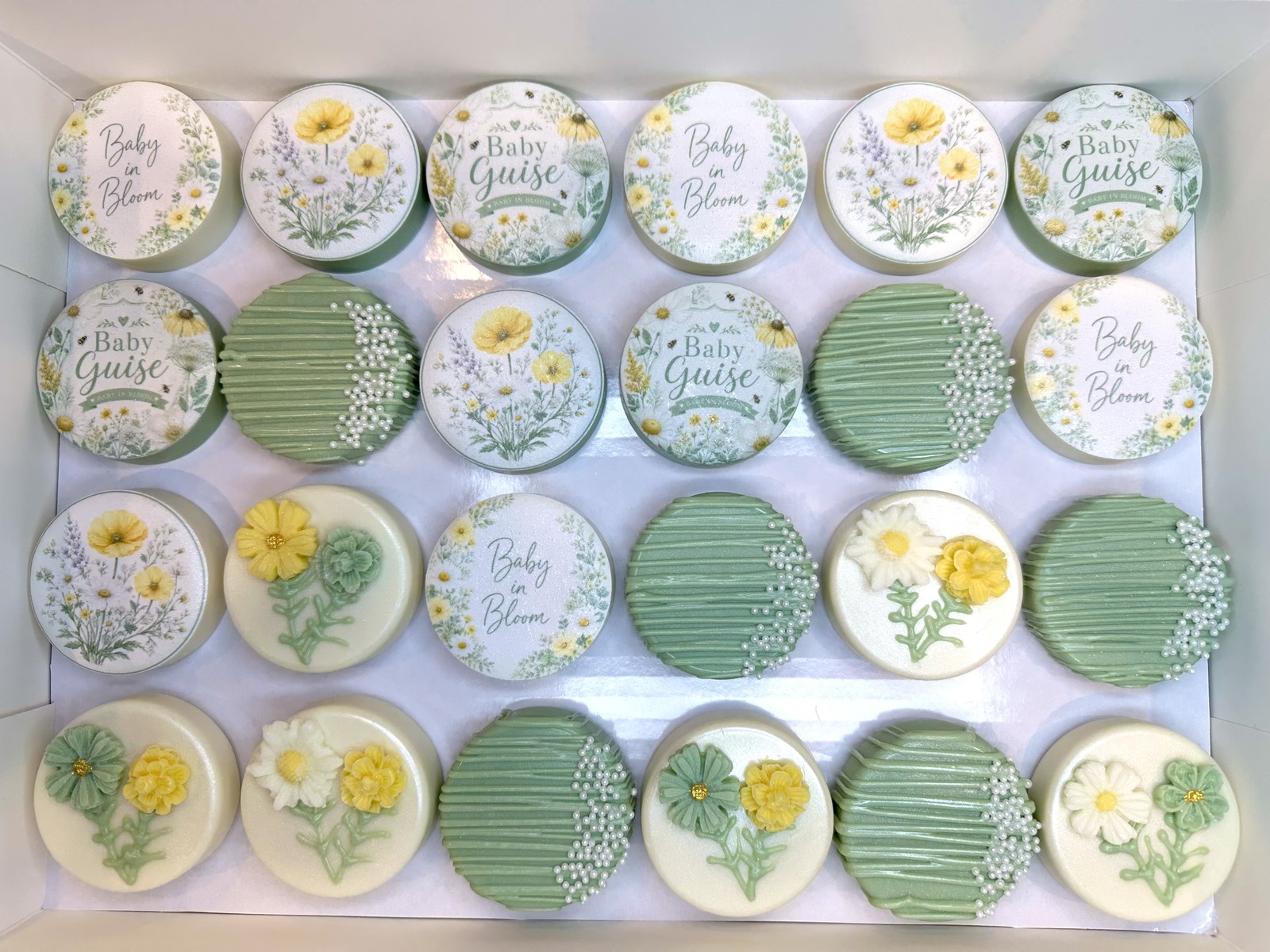Green, yellow, and white custom chocolate covered Oreos by Heavenly Dipped Delights